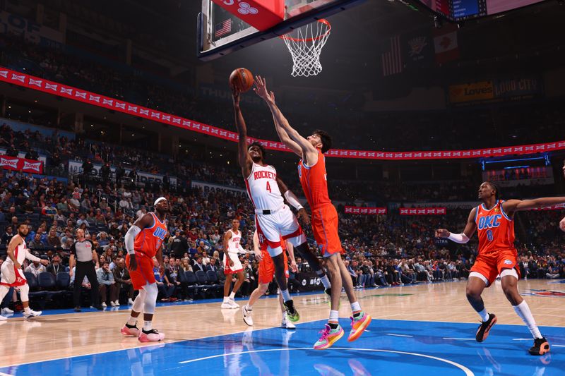 OKLAHOMA CITY, OK - FEBRUARY 27: Jalen Green #4 of the Houston Rockets drives to the basket during the game against the Oklahoma City Thunder on February, 2024 at Paycom Arena in Oklahoma City, Oklahoma. NOTE TO USER: User expressly acknowledges and agrees that, by downloading and or using this photograph, User is consenting to the terms and conditions of the Getty Images License Agreement. Mandatory Copyright Notice: Copyright 2024 NBAE (Photo by Zach Beeker/NBAE via Getty Images)