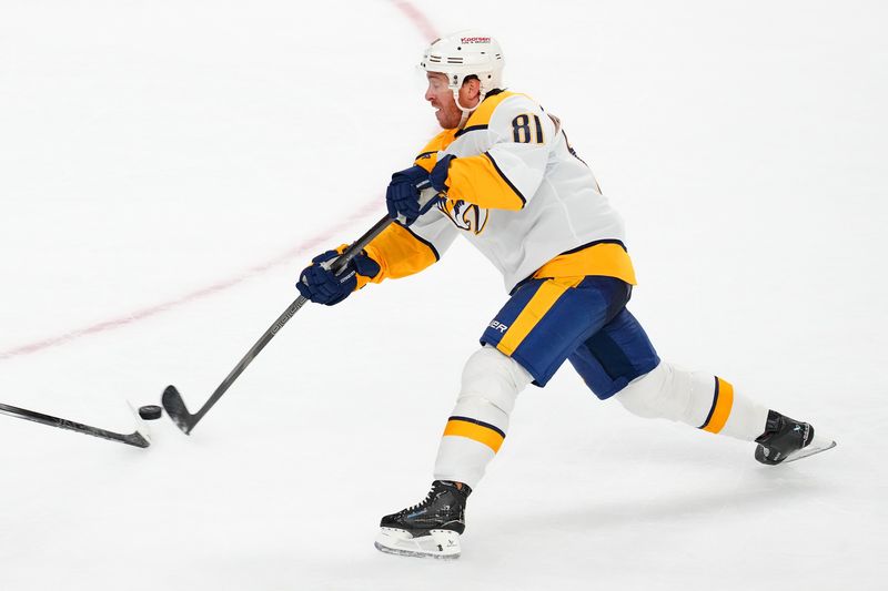 Apr 12, 2025; Las Vegas, Nevada, USA; Nashville Predators center Jonathan Marchessault (81) shoots against the Vegas Golden Knights during the third period at T-Mobile Arena. Mandatory Credit: Stephen R. Sylvanie-Imagn Images