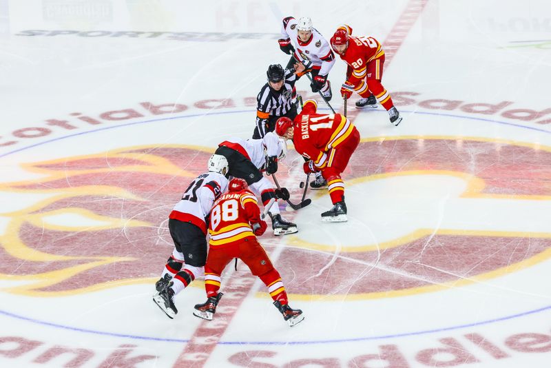 Jan 9, 2024; Calgary, Alberta, CAN; General view of the opening face-off between the Calgary Flames and the Ottawa Senators during the first period at Scotiabank Saddledome. Mandatory Credit: Sergei Belski-USA TODAY Sports