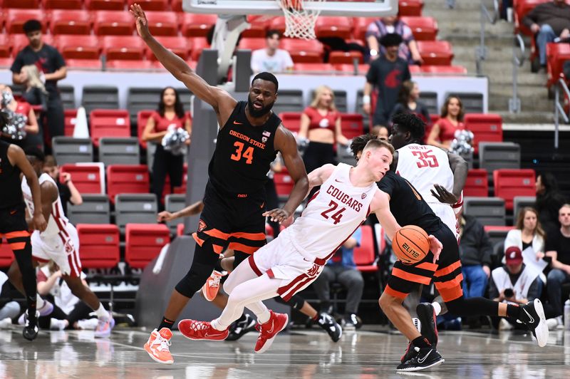 Feb 16, 2023; Pullman, Washington, USA; Washington State Cougars guard Justin Powell (24) is fouled by Oregon State Beavers forward Rodrigue Andela (34) in the first half at Friel Court at Beasley Coliseum. Mandatory Credit: James Snook-USA TODAY Sports