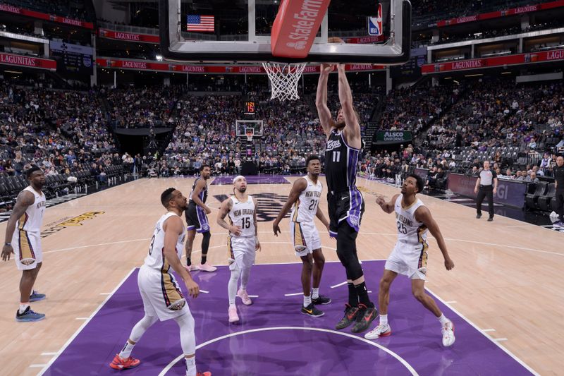 SACRAMENTO, CA - FEBRUARY 8:  Domantas Sabonis #11 of the Sacramento Kings drives to the basket during the game against the New Orleans Pelicans on February 8, 2025 at Golden 1 Center in Sacramento, California. NOTE TO USER: User expressly acknowledges and agrees that, by downloading and or using this Photograph, user is consenting to the terms and conditions of the Getty Images License Agreement. Mandatory Copyright Notice: Copyright 2025 NBAE (Photo by Rocky Widner/NBAE via Getty Images)