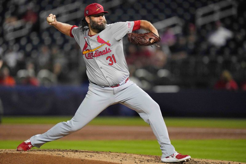 Mar 8, 2024; West Palm Beach, Florida, USA; St. Louis Cardinals starting pitcher Lance Lynn (31) pitches in the second inning against the St. Louis Cardinals at CACTI Park of the Palm Beaches. Mandatory Credit: Jim Rassol-USA TODAY Sports