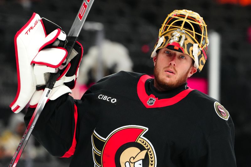 Oct 25, 2024; Las Vegas, Nevada, USA; Ottawa Senators goaltender Anton Forsberg (31) warms up before a game against the Vegas Golden Knights at T-Mobile Arena. Mandatory Credit: Stephen R. Sylvanie-Imagn Images