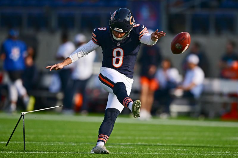 Chicago Bears kicker Cairo Santos (8) warms up before an NFL exhibition Hall of Fame football game against the Houston Texans, Thursday, Aug. 1, 2024, in Canton, Ohio. (AP Photo/David Dermer)