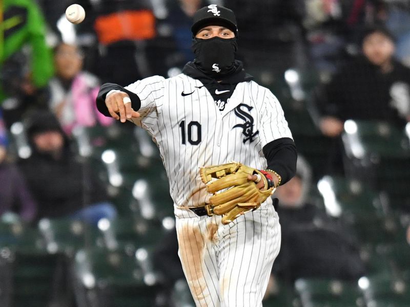 Apr 2, 2024; Chicago, Illinois, USA; Chicago White Sox third baseman Yoan Moncada (10) completes a double play after forcing out Atlanta Braves Ronald Acuna Jr (not pictured) during the eighth inning at Guaranteed Rate Field. Mandatory Credit: Patrick Gorski-USA TODAY Sports