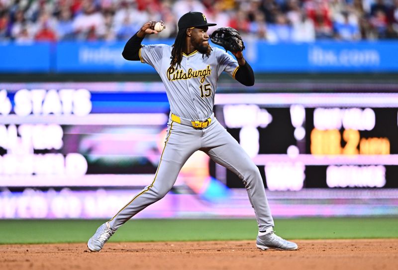 Apr 12, 2024; Philadelphia, Pennsylvania, USA; Pittsburgh Pirates shortstop Oneil Cruz (15) throws to first against the Philadelphia Phillies in the third inning at Citizens Bank Park. Mandatory Credit: Kyle Ross-USA TODAY Sports