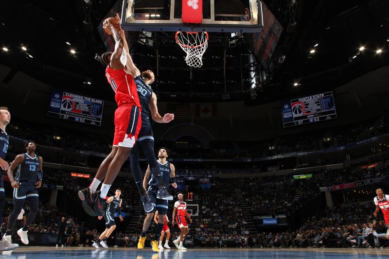 MEMPHIS, TN - NOVEMBER 8: Jay Huff #30 of the Memphis Grizzlies blocks the ball during the game against the Washington Wizards on November 8, 2024 at FedExForum in Memphis, Tennessee. NOTE TO USER: User expressly acknowledges and agrees that, by downloading and or using this photograph, User is consenting to the terms and conditions of the Getty Images License Agreement. Mandatory Copyright Notice: Copyright 2024 NBAE (Photo by Joe Murphy/NBAE via Getty Images)