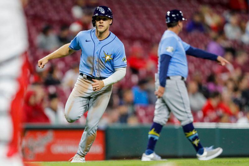 Apr 18, 2023; Cincinnati, Ohio, USA; Tampa Bay Rays second baseman Taylor Walls (6) scores on a double hit by catcher Francisco Mejia (not pictured) in the ninth inning against the Cincinnati Reds at Great American Ball Park. Mandatory Credit: Katie Stratman-USA TODAY Sports