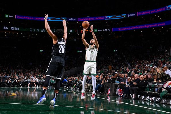 BOSTON, MA - NOVEMBER 10: Derrick White #9 of the Boston Celtics shoots a three point basket during the In-Season Tournament on November 10, 2023 at the TD Garden in Boston, Massachusetts. NOTE TO USER: User expressly acknowledges and agrees that, by downloading and or using this photograph, User is consenting to the terms and conditions of the Getty Images License Agreement. Mandatory Copyright Notice: Copyright 2023 NBAE  (Photo by Brian Babineau/NBAE via Getty Images)