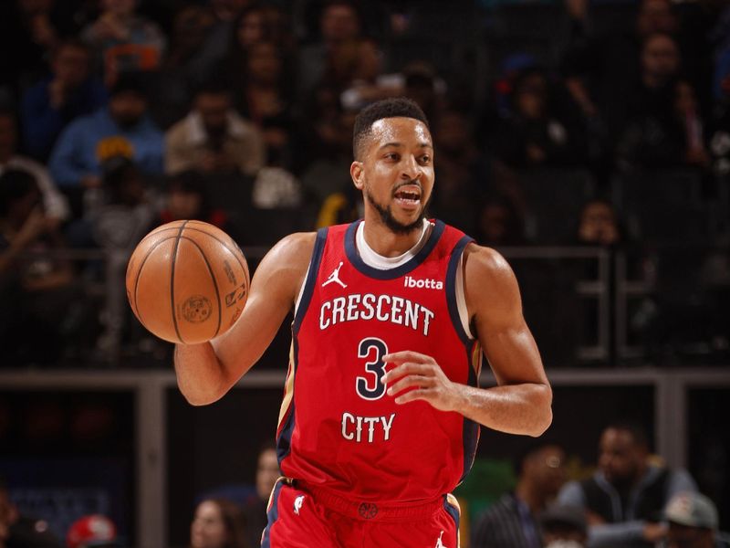 DETROIT, MI - MARCH 24: CJ McCollum #3 of the New Orleans Pelicans brings the ball up court during the game against the Detroit Pistons on March 24, 2024 at Little Caesars Arena in Detroit, Michigan. NOTE TO USER: User expressly acknowledges and agrees that, by downloading and/or using this photograph, User is consenting to the terms and conditions of the Getty Images License Agreement. Mandatory Copyright Notice: Copyright 2024 NBAE (Photo by Brian Sevald/NBAE via Getty Images)