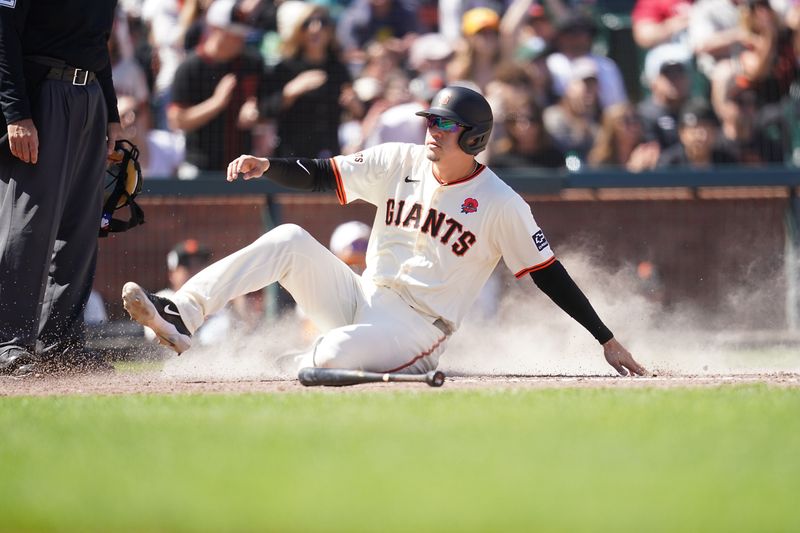 May 27, 2024; San Francisco, California, USA; San Francisco Giants pinch runner Wilmer Flores (41) scores a run against the Philadelphia Phillies in the fifth inning at Oracle Park. Mandatory Credit: Cary Edmondson-USA TODAY Sports