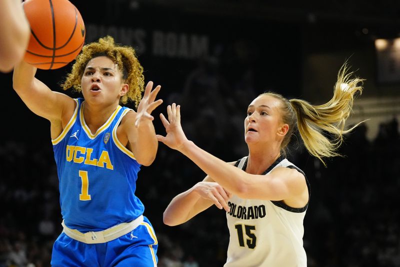 Jan 19, 2024; Boulder, Colorado, USA; UCLA Bruins guard Kiki Rice (1) and Colorado Buffaloes guard Kindyll Wetta (15) reach for the ball in the first quarter at the CU Events Center. Mandatory Credit: Ron Chenoy-USA TODAY Sports
\v11