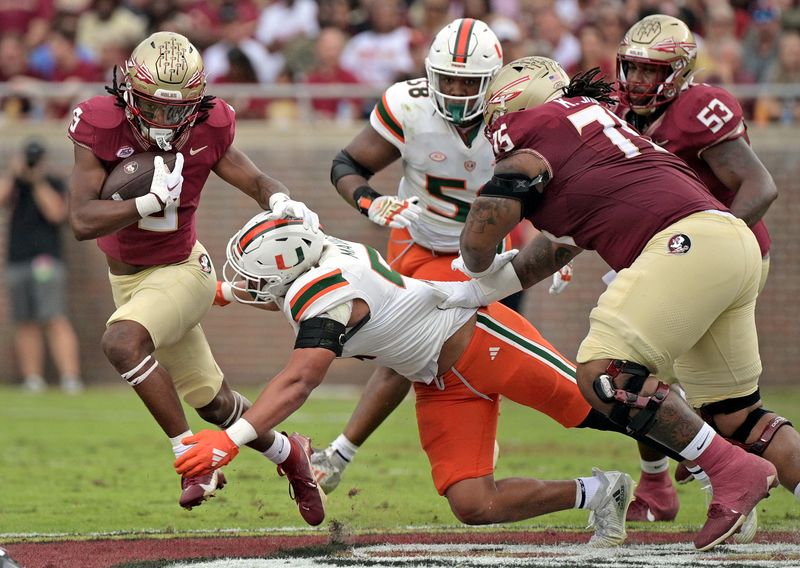 Nov 11, 2023; Tallahassee, Florida, USA; Florida State Seminoles running back Lawrance Toafili (9) runs the ball during the first half against the Miami Hurricanes at Doak S. Campbell Stadium. Mandatory Credit: Melina Myers-USA TODAY Sports