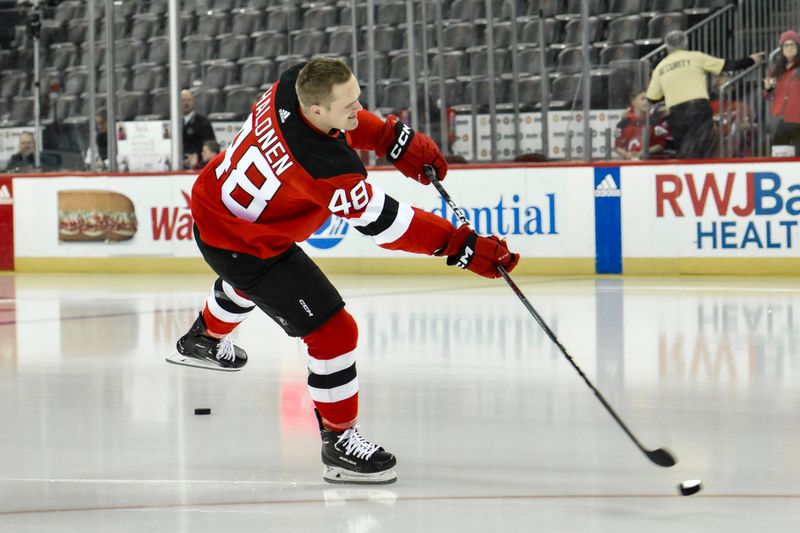 Feb 25, 2024; Newark, New Jersey, USA; New Jersey Devils left wing Brian Halonen (48) enters the ice for his rookie skate lap before a game against the Tampa Bay Lightning at Prudential Center. Mandatory Credit: John Jones-USA TODAY Sports