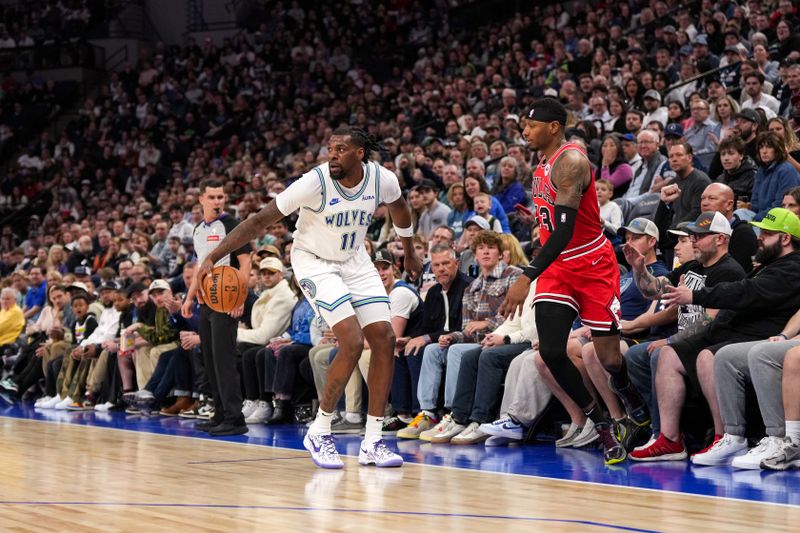 MINNEAPOLIS, MN -  MARCH 31: Naz Reid #11 of the Minnesota Timberwolves handles the ball during the game against the Chicago Bulls on March 31, 2024 at Target Center in Minneapolis, Minnesota. NOTE TO USER: User expressly acknowledges and agrees that, by downloading and or using this Photograph, user is consenting to the terms and conditions of the Getty Images License Agreement. Mandatory Copyright Notice: Copyright 2024 NBAE (Photo by Jordan Johnson/NBAE via Getty Images)