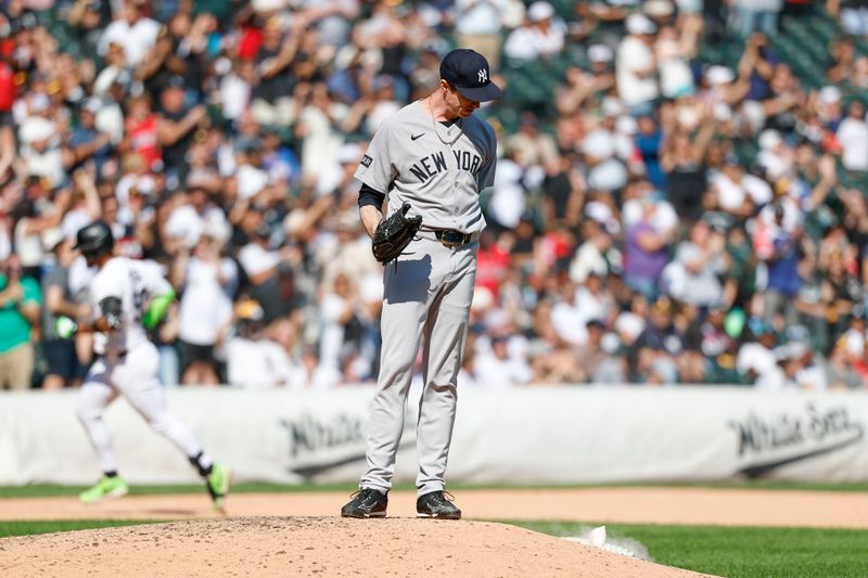 Aug 31, 2025; Chicago, Illinois, USA; New York Yankees relief pitcher Tim Hill (41) reacts after giving up a solo home run to Chicago White Sox first baseman Lenyn Sosa (50) during the eight inning at Rate Field. Mandatory Credit: Kamil Krzaczynski-Imagn Images