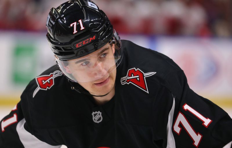 Oct 26, 2024; Buffalo, New York, USA;  Buffalo Sabres center Ryan McLeod (71) waits for the face-off during the second period against the Detroit Red Wings at KeyBank Center. Mandatory Credit: Timothy T. Ludwig-Imagn Images