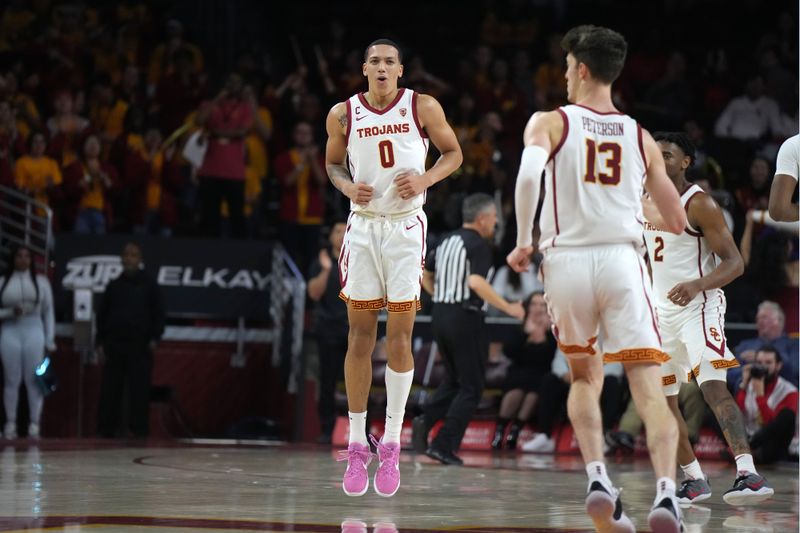 January 14, 2023; Los Angeles, California, USA; Southern California Trojans forward Kobe Johnson (0) celebrates against the Utah Utes in the second half at Galen Center. Mandatory Credit: Kirby Lee-USA TODAY Sports