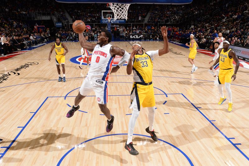 DETROIT, MI - OCTOBER 23: Jalen Duren #0 of the Detroit Pistons rebounds the ball during the game against the Indiana Pacers on October 23, 2024 at Little Caesars Arena in Detroit, Michigan. NOTE TO USER: User expressly acknowledges and agrees that, by downloading and/or using this photograph, User is consenting to the terms and conditions of the Getty Images License Agreement. Mandatory Copyright Notice: Copyright 2024 NBAE (Photo by Chris Schwegler/NBAE via Getty Images)