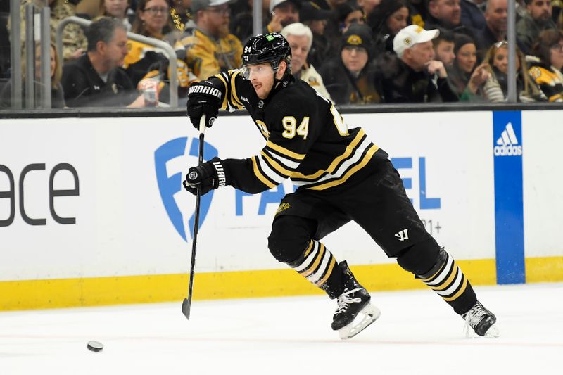 Mar 19, 2024; Boston, Massachusetts, USA;  Boston Bruins center Jakub Lauko (94) passes the puck during the first period against the Ottawa Senators at TD Garden. Mandatory Credit: Bob DeChiara-USA TODAY Sports