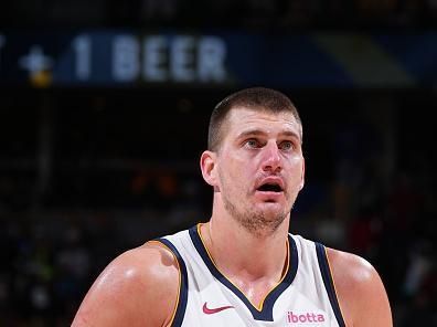 DENVER, CO - DECEMBER 25: Nikola Jokic #15 of the Denver Nuggets prepares to shoot a free throw during the game against the Golden State Warriors on December 25, 2023 at the Ball Arena in Denver, Colorado. NOTE TO USER: User expressly acknowledges and agrees that, by downloading and/or using this Photograph, user is consenting to the terms and conditions of the Getty Images License Agreement. Mandatory Copyright Notice: Copyright 2023 NBAE (Photo by Garrett Ellwood/NBAE via Getty Images)