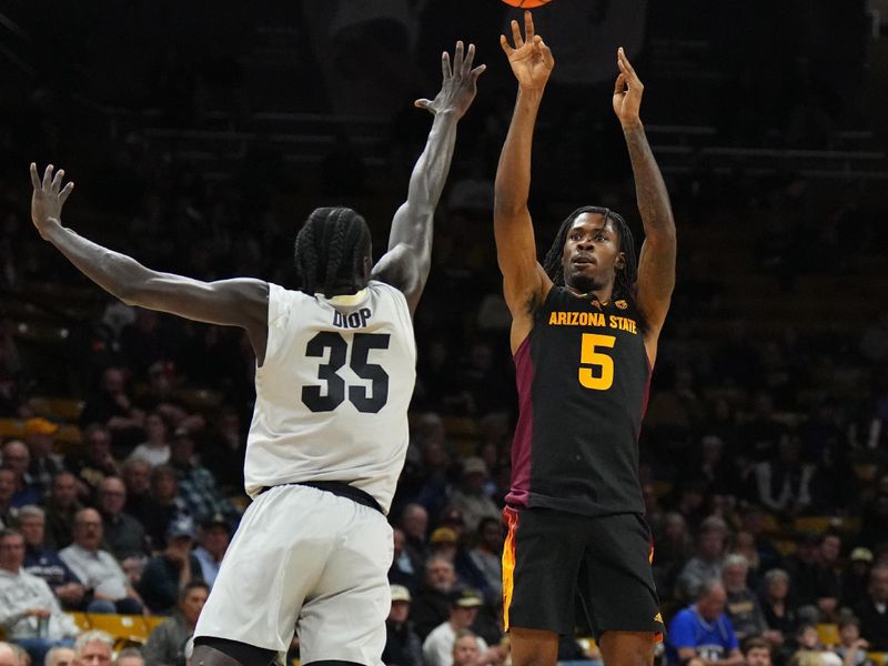 Feb 8, 2024; Boulder, Colorado, USA; Arizona State Sun Devils guard Jamiya Neal (5) shoots over Colorado Buffaloes forward Assane Diop (35) in the first half at the CU Events Center. Mandatory Credit: Ron Chenoy-USA TODAY Sports