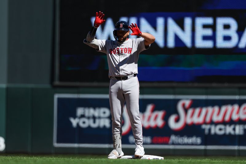 May 5, 2024; Minneapolis, Minnesota, USA; Boston Red Sox Dominic Smith (2) celebrates his two RBI double against the Minnesota Twins during the eighth inning at Target Field. Mandatory Credit: Matt Krohn-USA TODAY Sports