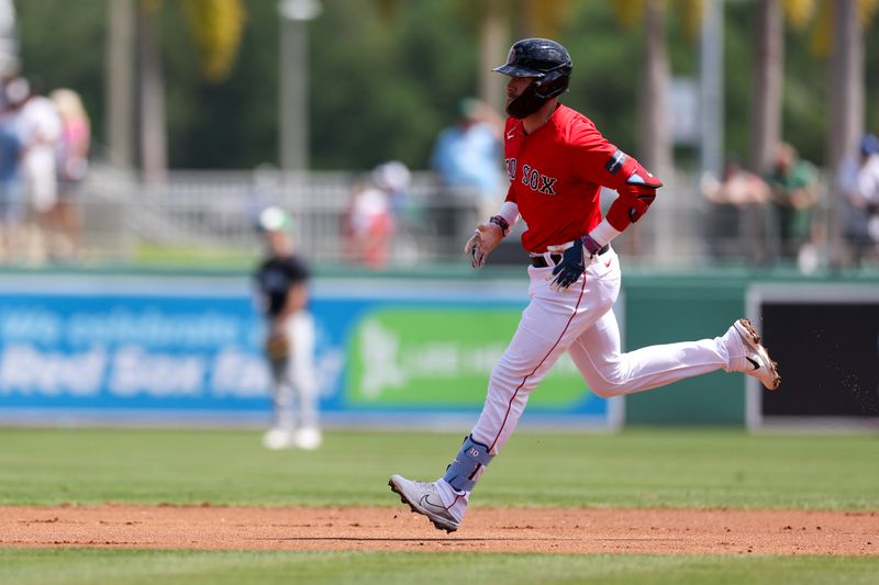 Mar 17, 2024; Fort Myers, Florida, USA;  Boston Red Sox shortstop Trevor Story (10) runs the bases after hitting a three-run home run against the New York Yankees in the first inning at JetBlue Park at Fenway South. Mandatory Credit: Nathan Ray Seebeck-USA TODAY Sports