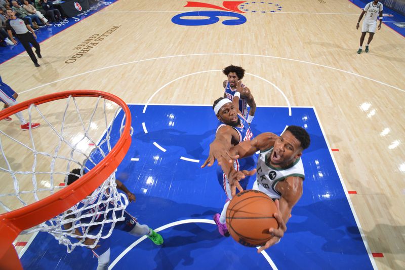 PHILADELPHIA, PA - OCTOBER 23: Giannis Antetokounmpo #34 of the Milwaukee Bucks drives to the basket during the game against the Philadelphia 76ers on October 23, 2024 at the Wells Fargo Center in Philadelphia, Pennsylvania NOTE TO USER: User expressly acknowledges and agrees that, by downloading and/or using this Photograph, user is consenting to the terms and conditions of the Getty Images License Agreement. Mandatory Copyright Notice: Copyright 2024 NBAE (Photo by Jesse D. Garrabrant/NBAE via Getty Images)