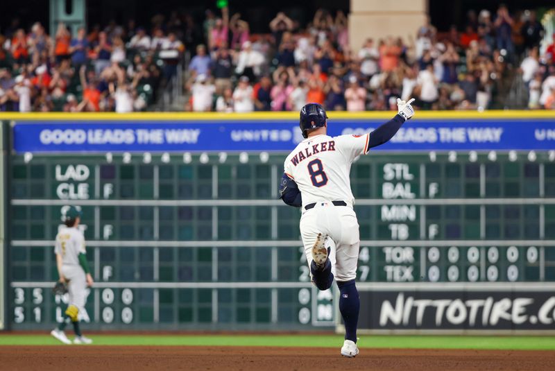 May 27, 2025; Houston, Texas, USA; Houston Astros first baseman Christian Walker (8) rounds the bases after hitting a two-run home run against the Athletics in the sixth inning at Daikin Park. Mandatory Credit: Thomas Shea-Imagn Images