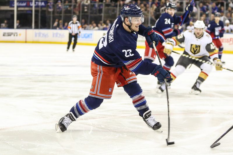 Jan 26, 2024; New York, New York, USA; New York Rangers center Jonny Brodzinski (22) attempts a shot on goal in the second period against the Vegas Golden Knights at Madison Square Garden. Mandatory Credit: Wendell Cruz-USA TODAY Sports