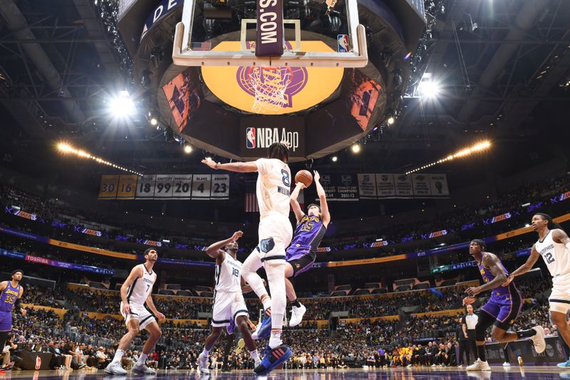 LOS ANGELES, CA - JANUARY 5:  Austin Reaves #15 of the Los Angeles Lakers goes to the basket during the game on January 5, 2024 at Crypto.Com Arena in Los Angeles, California. NOTE TO USER: User expressly acknowledges and agrees that, by downloading and/or using this Photograph, user is consenting to the terms and conditions of the Getty Images License Agreement. Mandatory Copyright Notice: Copyright 2024 NBAE (Photo by Andrew D. Bernstein/NBAE via Getty Images)