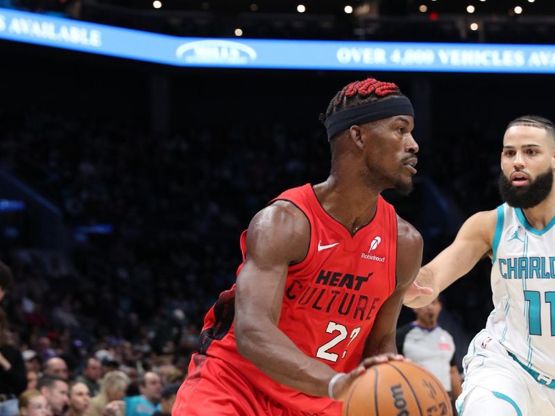 CHARLOTTE, NC - NOVEMBER 27: Jimmy Butler #22 of the Miami Heat dribbles the ball during the game against the Charlotte Hornets on November 27, 2024 at Spectrum Center in Charlotte, North Carolina. NOTE TO USER: User expressly acknowledges and agrees that, by downloading and or using this photograph, User is consenting to the terms and conditions of the Getty Images License Agreement. Mandatory Copyright Notice: Copyright 2024 NBAE (Photo by Brock Williams-Smith/NBAE via Getty Images)