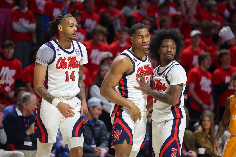 Mar 5, 2025; Oxford, Mississippi, USA; Mississippi Rebels guard Dre Davis (14), guard Matthew Murrell (11), and guard Jaylen Murray (5) looks on against the Tennessee Volunteers during the first half at The Sandy and John Black Pavilion at Ole Miss. Mandatory Credit: Wesley Hale-Imagn Images