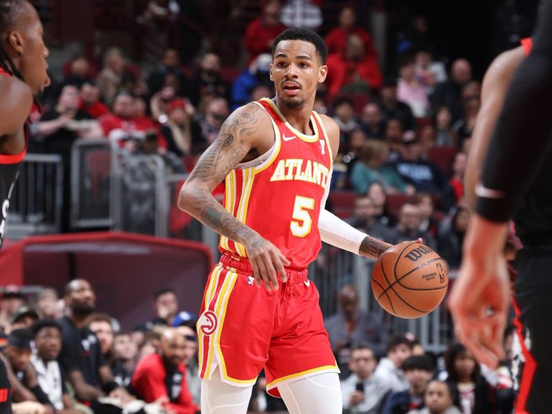 CHICAGO, IL - APRIL 1: Dejounte Murray #5 of the Atlanta Hawks dribbles the ball during the game against the Chicago Bulls on April 1, 2024 at United Center in Chicago, Illinois. NOTE TO USER: User expressly acknowledges and agrees that, by downloading and or using this photograph, User is consenting to the terms and conditions of the Getty Images License Agreement. Mandatory Copyright Notice: Copyright 2024 NBAE (Photo by Jeff Haynes/NBAE via Getty Images)