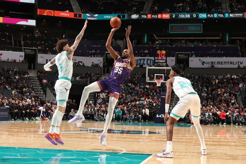 CHARLOTTE, NC - JANUARY 7: Kevin Durant #35 of the Phoenix Suns shoots the ball during the game against the Charlotte Hornets on January 7, 2025 at Spectrum Center in Charlotte, North Carolina. NOTE TO USER: User expressly acknowledges and agrees that, by downloading and or using this photograph, User is consenting to the terms and conditions of the Getty Images License Agreement. Mandatory Copyright Notice: Copyright 2025 NBAE (Photo by Kent Smith/NBAE via Getty Images)