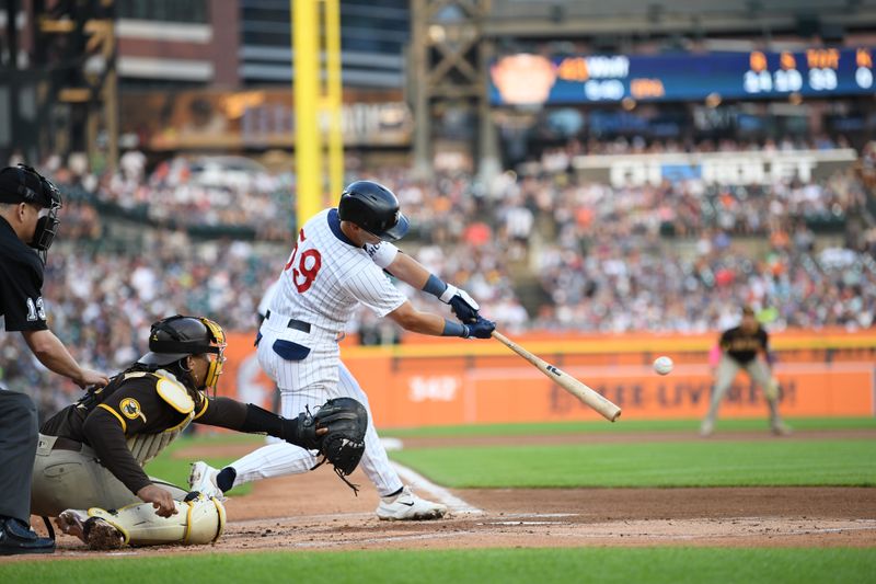 Jul 22, 2023; Detroit, Michigan, USA; Detroit Tigers third baseman Zack Short (59) hits a two-run single off San Diego Padres starting pitcher JacksonWolf (43) (not pictured) in the second inning at Comerica Park. Mandatory Credit: Lon Horwedel-USA TODAY Sports