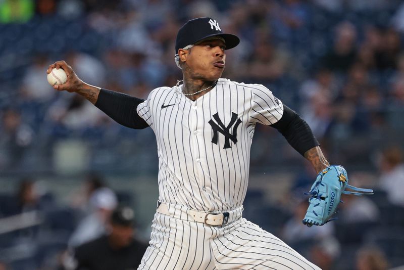 Sep 10, 2024; Bronx, New York, USA; New York Yankees starting pitcher Marcus Stroman (0) delivers a pitch during the first inning against the Kansas City Royals at Yankee Stadium. Mandatory Credit: Vincent Carchietta-Imagn Images