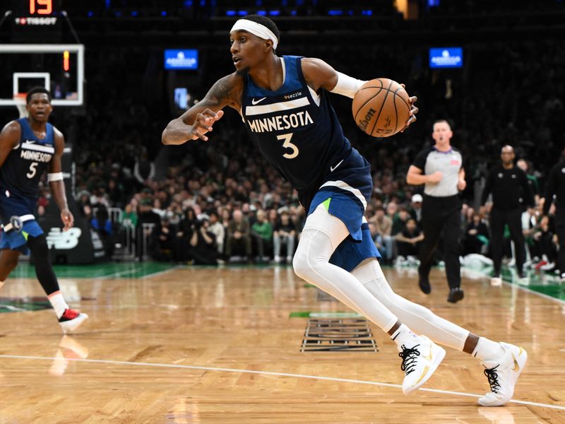 BOSTON, MASSACHUSETTS - NOVEMBER 24: Jaden McDaniels #3 of the Minnesota Timberwolves drives to the basket against the Boston Celtics during the fourth quarter at the TD Garden on November 24, 2024 in Boston, Massachusetts. NOTE TO USER: User expressly acknowledges and agrees that, by downloading and or using this photograph, User is consenting to the terms and conditions of the Getty Images License Agreement. (Photo by Brian Fluharty/Getty Images)