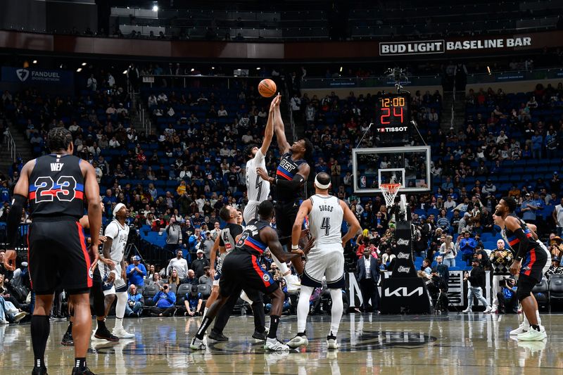 ORLANDO, FL - NOVEMBER 23: Goga Bitadze #35 of the Orlando Magic and Jalen Duren #0 of the Detroit Pistons takes tip off during the game on November 23, 2024 at Kia Center in Orlando, Florida. NOTE TO USER: User expressly acknowledges and agrees that, by downloading and or using this photograph, User is consenting to the terms and conditions of the Getty Images License Agreement. Mandatory Copyright Notice: Copyright 2024 NBAE (Photo by Fernando Medina/NBAE via Getty Images)