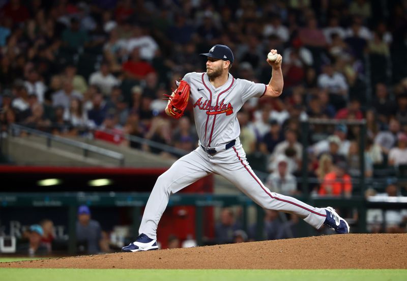 Jul 9, 2024; Phoenix, Arizona, USA; Atlanta Braves pitcher Chris Sale throws in the third inning against the Arizona Diamondbacks at Chase Field. Mandatory Credit: Mark J. Rebilas-USA TODAY Sports