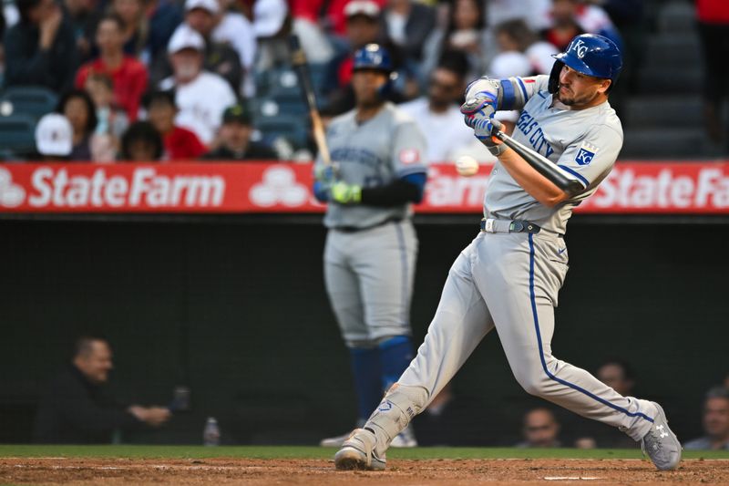 May 11, 2024; Anaheim, California, USA; Kansas City Royals first baseman Vinnie Pasquantino (9) hits a ground ball out against the Los Angeles Angels during the fourth inning at Angel Stadium. Mandatory Credit: Jonathan Hui-USA TODAY Sports