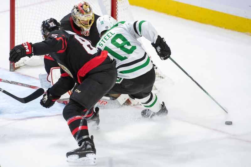 Feb 22, 2024; Ottawa, Ontario, CAN; Dallas Stars center Sam Steel (18) is angled off the puck by Ottawa Senators defenseman Jake Sanderson (85) in the third period at the Canadian Tire Centre. Mandatory Credit: Marc DesRosiers-USA TODAY Sports