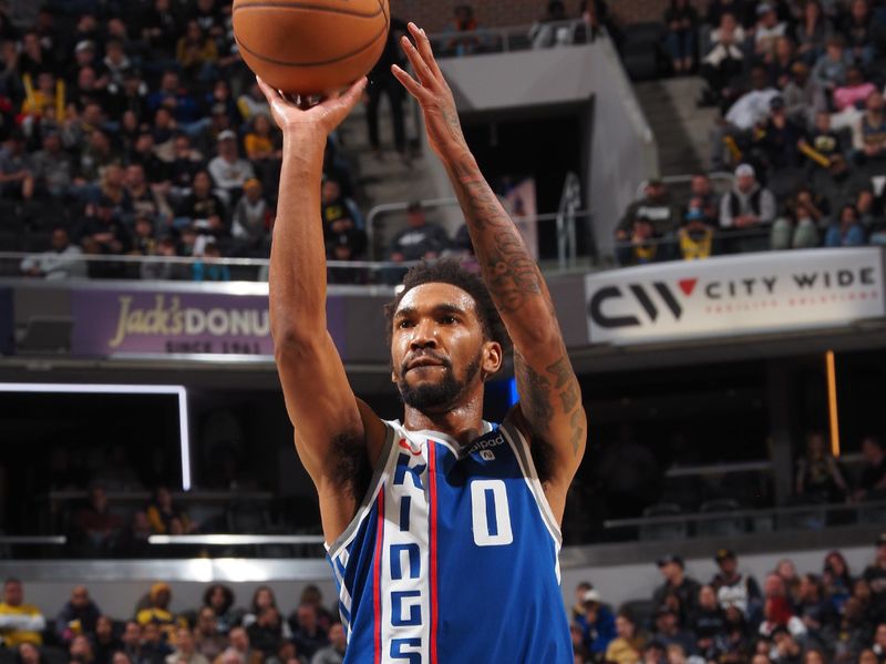 INDIANAPOLIS, IN - FEBRUARY 2: Malik Monk #0 of the Sacramento Kings shoots a free throw during the game against the Indiana Pacers on February 2, 2024 at Gainbridge Fieldhouse in Indianapolis, Indiana. NOTE TO USER: User expressly acknowledges and agrees that, by downloading and or using this Photograph, user is consenting to the terms and conditions of the Getty Images License Agreement. Mandatory Copyright Notice: Copyright 2024 NBAE (Photo by Ron Hoskins/NBAE via Getty Images)
