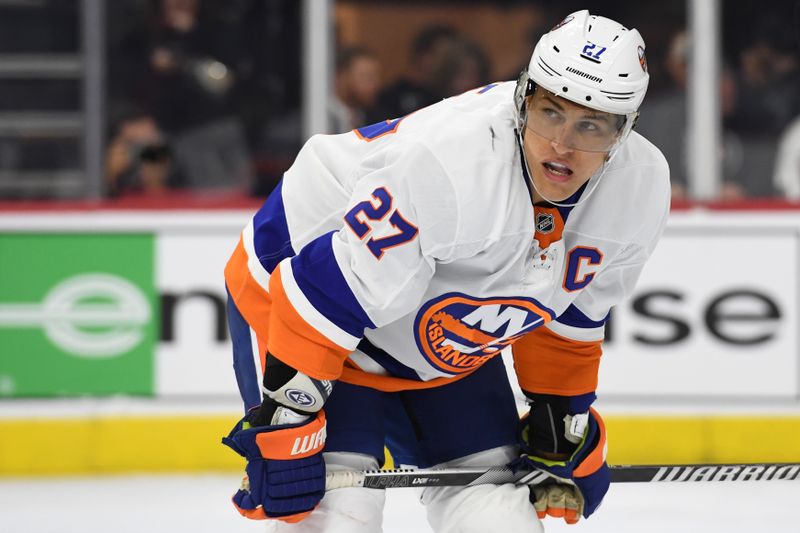 Sep 26, 2024; Philadelphia, Pennsylvania, USA; New York Islanders left wing Anders Lee (27) against the Philadelphia Flyers during the third period at Wells Fargo Center. Mandatory Credit: Eric Hartline-Imagn Images