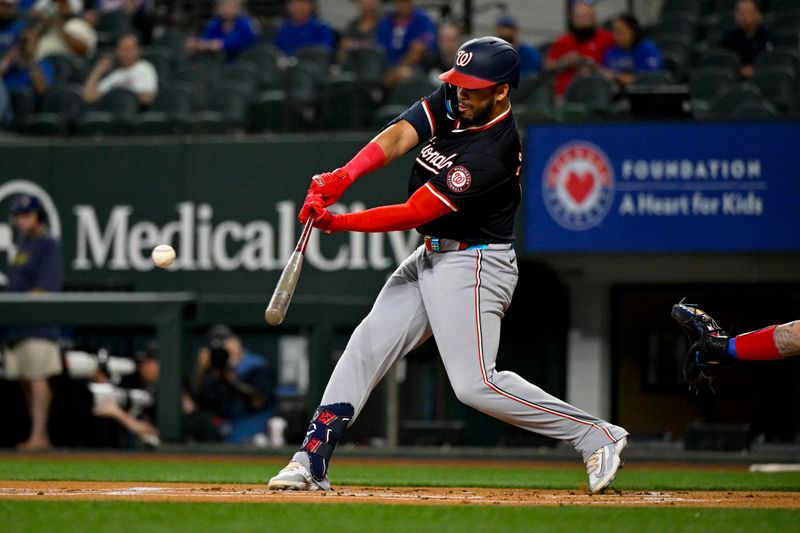 May 2, 2024; Arlington, Texas, USA; Washington Nationals second baseman Luis Garcia Jr. (2) hits a double against the Texas Rangers during the first inning at Globe Life Field. Mandatory Credit: Jerome Miron-USA TODAY Sports