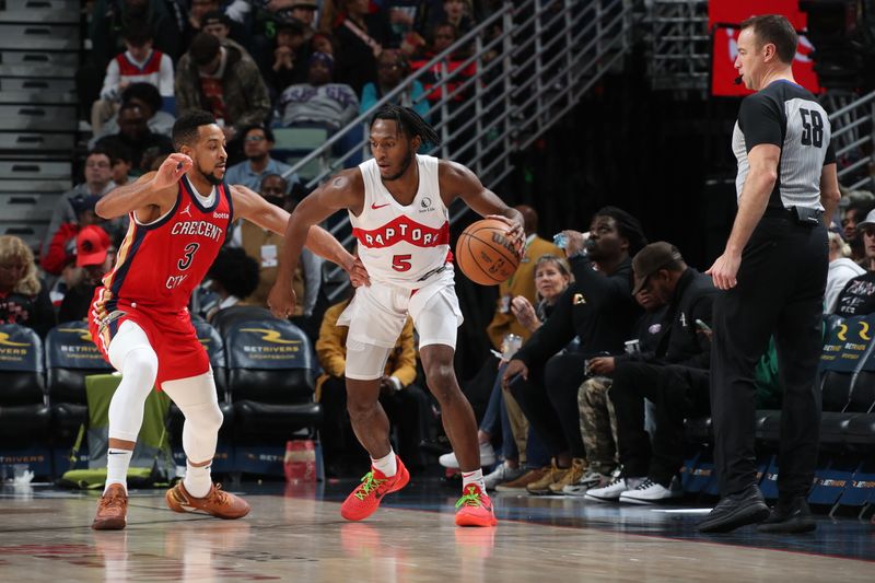 NEW ORLEANS, LA - FEBRUARY 5: Immanuel Quickley #5 of the Toronto Raptors handles the ball against CJ McCollum #3 of the New Orleans Pelicans during the game on February 5, 2024 at the Smoothie King Center in New Orleans, Louisiana. NOTE TO USER: User expressly acknowledges and agrees that, by downloading and or using this Photograph, user is consenting to the terms and conditions of the Getty Images License Agreement. Mandatory Copyright Notice: Copyright 2024 NBAE (Photo by Layne Murdoch Jr./NBAE via Getty Images)