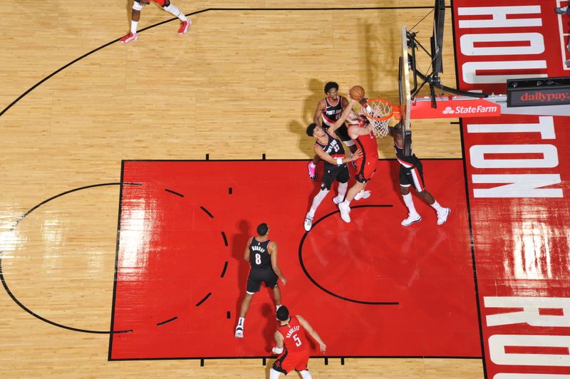 HOUSTON, TX - MARCH 25: Jock Landale #2 of the Houston Rockets drives to the basket during the game against the Portland Trail Blazers on March 25, 2024 at the Toyota Center in Houston, Texas. NOTE TO USER: User expressly acknowledges and agrees that, by downloading and or using this photograph, User is consenting to the terms and conditions of the Getty Images License Agreement. Mandatory Copyright Notice: Copyright 2024 NBAE (Photo by Logan Riely/NBAE via Getty Images)