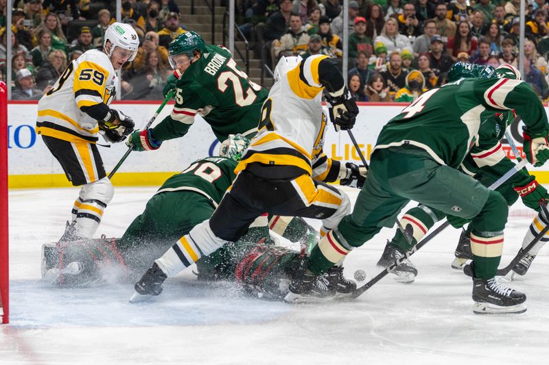 Feb 9, 2024; Saint Paul, Minnesota, USA; Minnesota Wild goaltender Marc-Andre Fleury (29) makes a save in traffic as Pittsburgh Penguins right wing Reilly Smith (19) fights for a rebound in the first period at Xcel Energy Center. Mandatory Credit: Matt Blewett-USA TODAY Sports