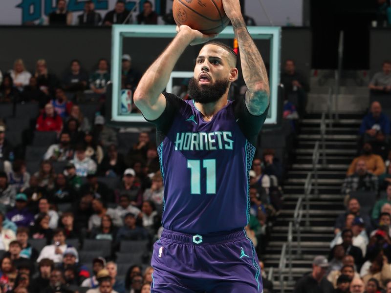 CHARLOTTE, NC - DECEMBER 3: Cody Martin #11 of the Charlotte Hornets shoots the ball during the game against the Philadelphia 76ers during an NBA Emirates Cup game on December 3, 2024 at Spectrum Center in Charlotte, North Carolina. NOTE TO USER: User expressly acknowledges and agrees that, by downloading and or using this photograph, User is consenting to the terms and conditions of the Getty Images License Agreement. Mandatory Copyright Notice: Copyright 2024 NBAE (Photo by Kent Smith/NBAE via Getty Images)